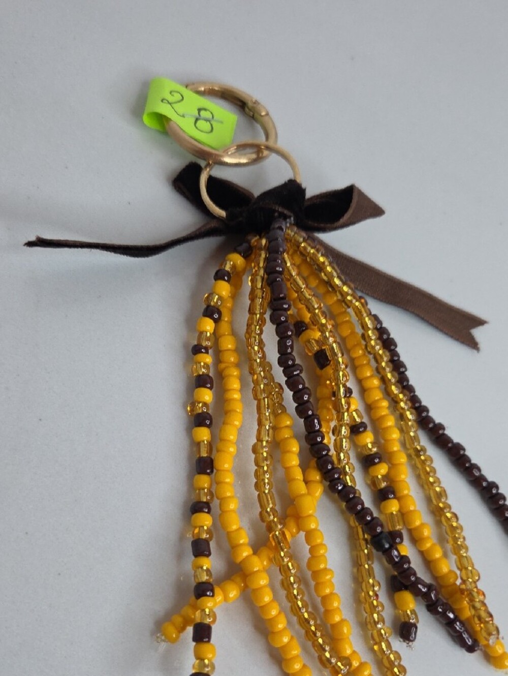 28 - Beaded Tassel Bag Charm in Yellow & Brown - Picture 3 of 3